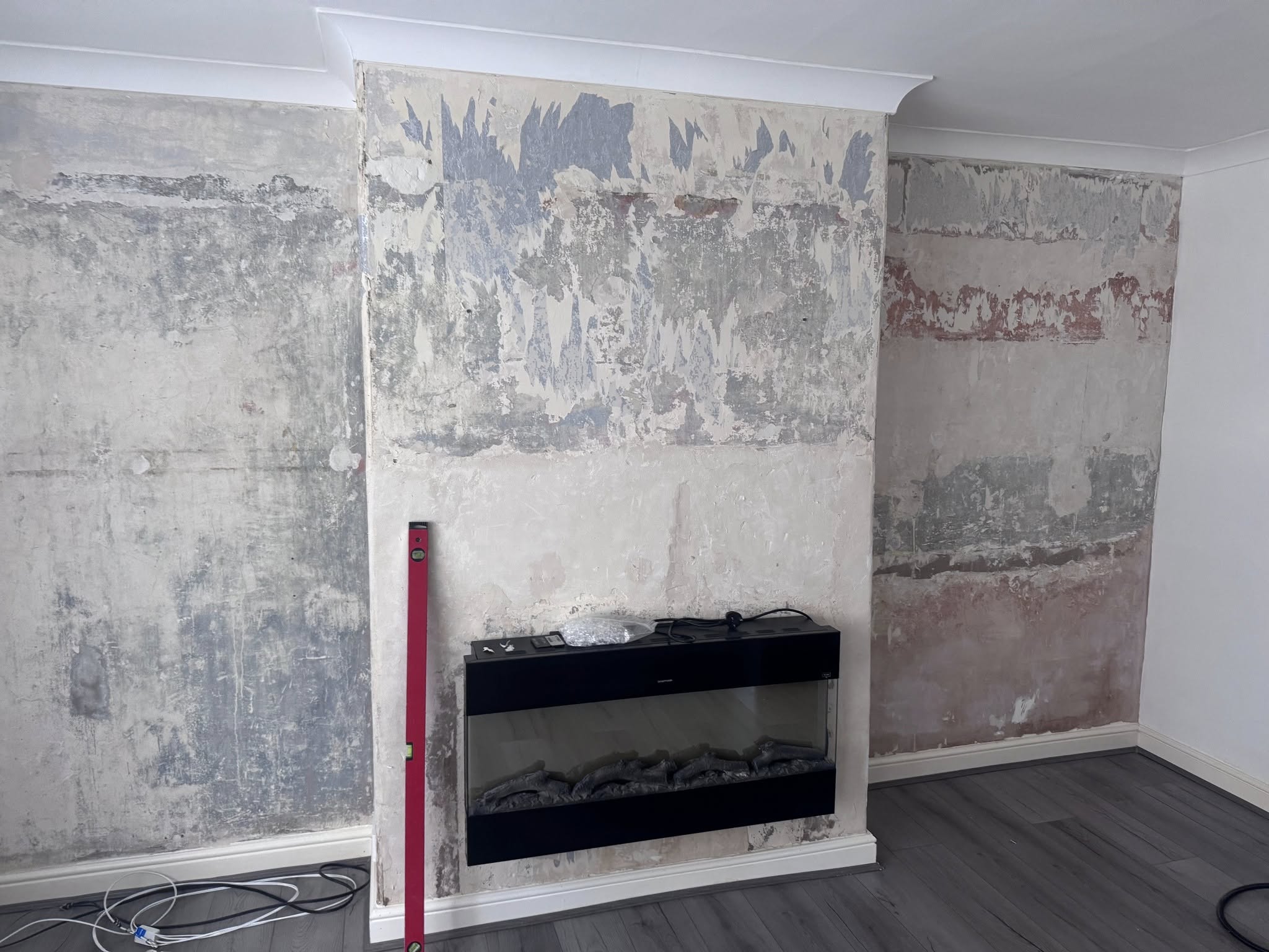 Finished media wall with TV, fire, and tidy cabling